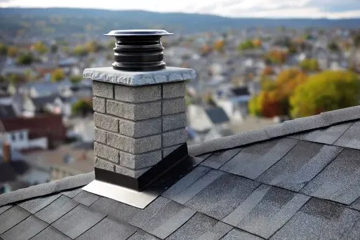 Block chimney with a cap in White Plains